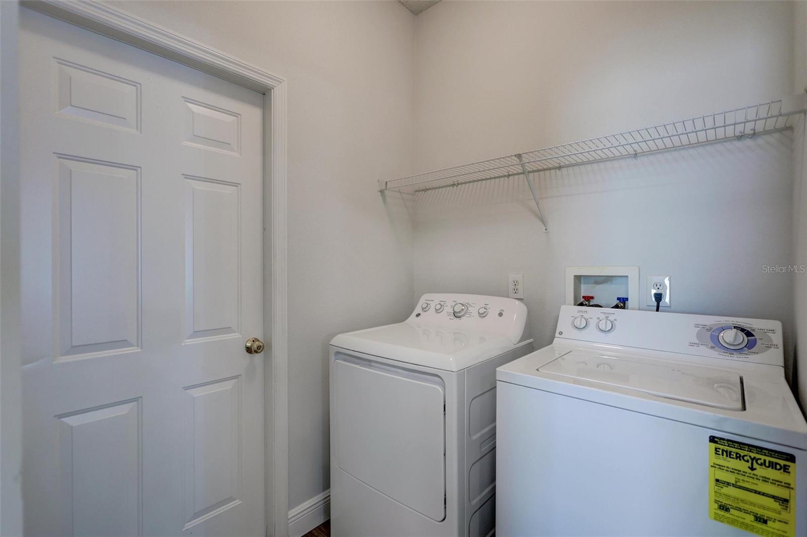 Separate enclosed laundry room