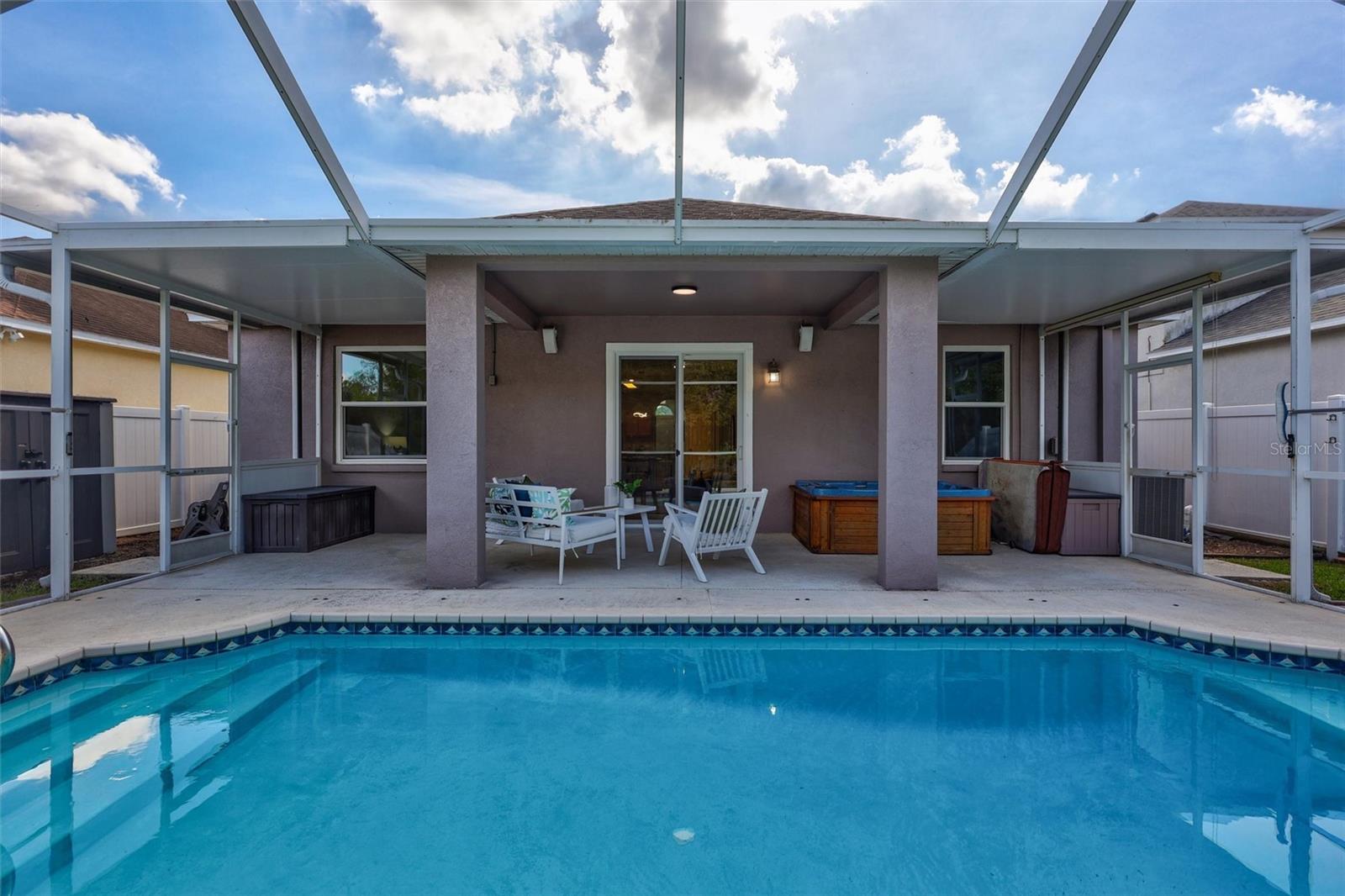 Fully Enclosed patio with pool and Jacuzzi