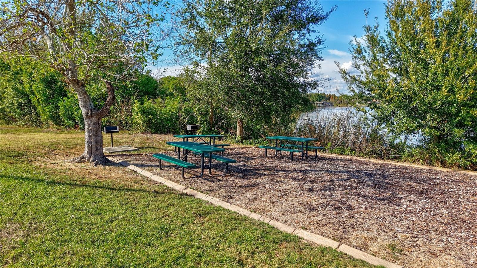 Private common areas with picnic tables and grills.