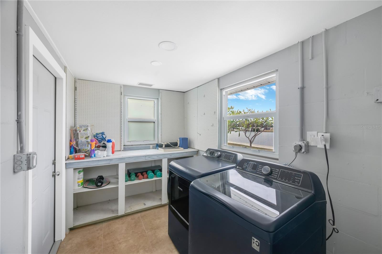 Inside Laundry Room and additional storage.
