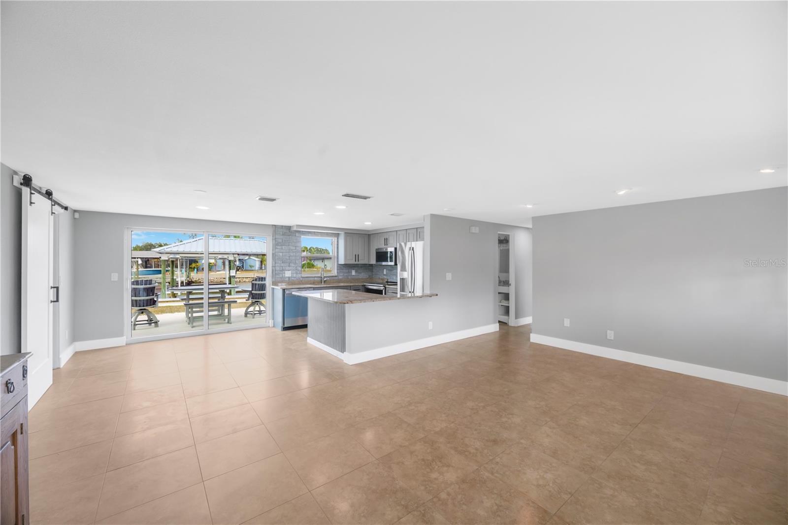 Fresh neutral paint enhances the bright, inviting feel of the living room.