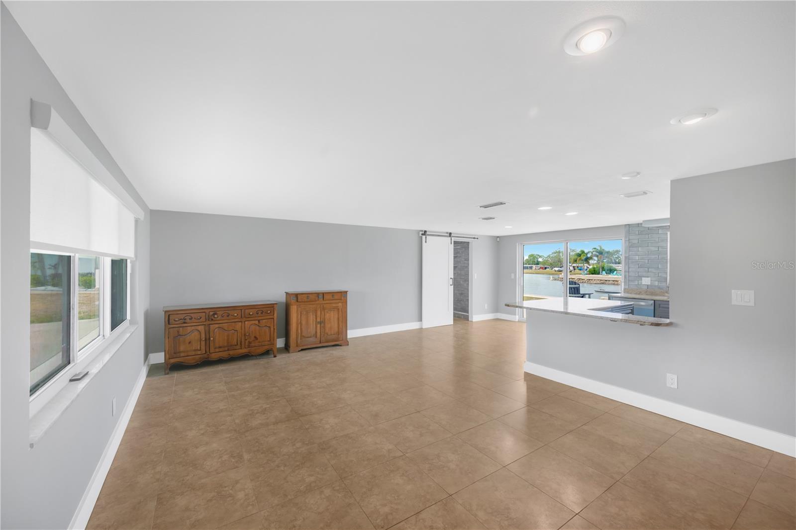 Your eye is drawn to the spetacular water views from the moment you walk into this home.