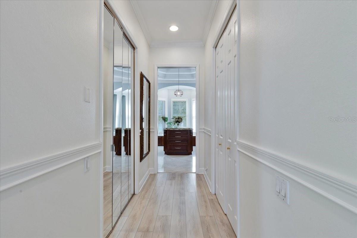 Hallway to Ensuite with His and Hers Closets