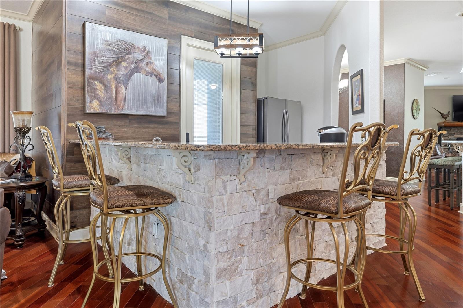 Wet Bar in Living Room area with full sized new refrigerator.