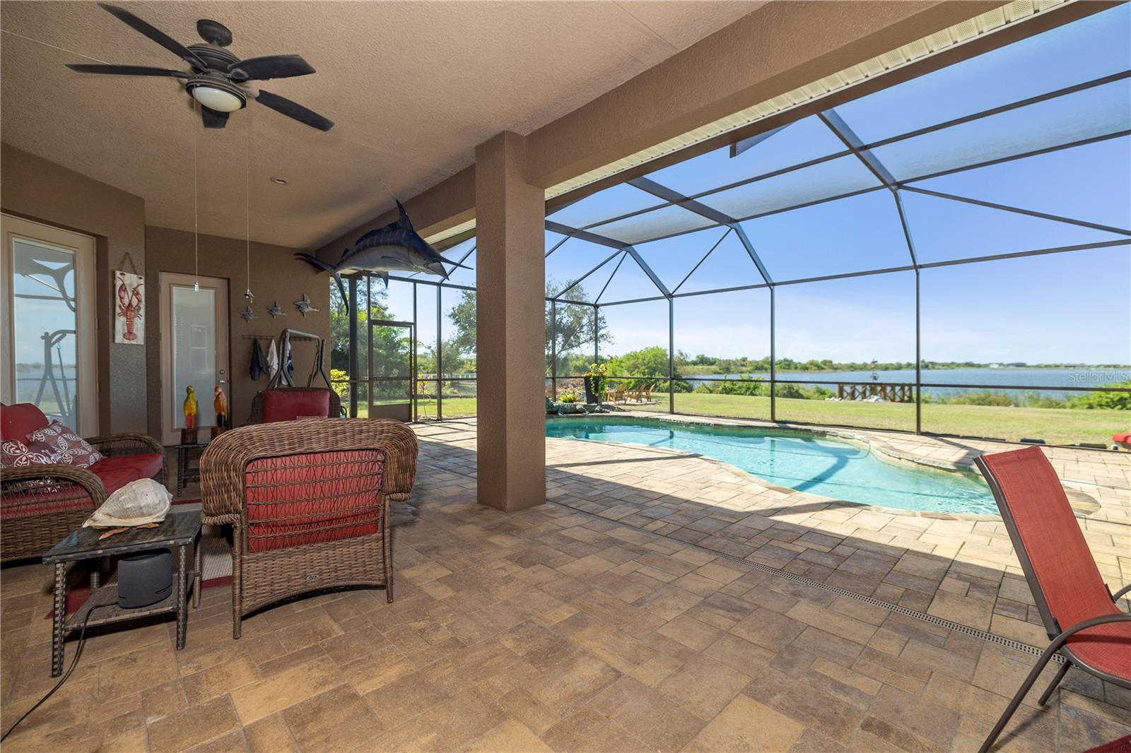 View of the lake from your covered back patio.