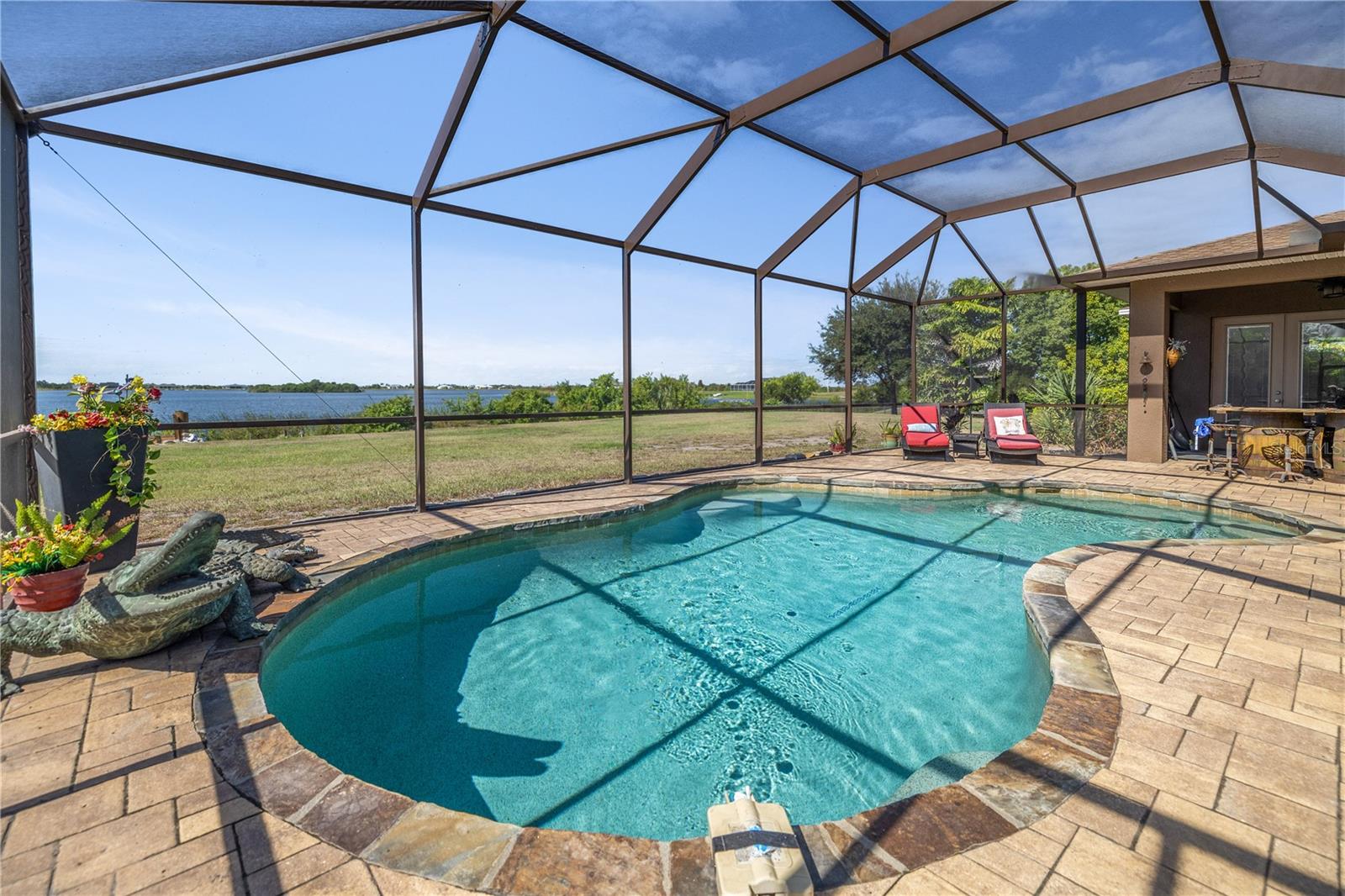 Enjoy the unobstructed view of the lake from your pool