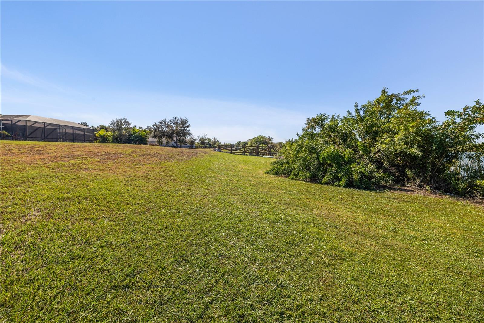 The home is elevated from the lake area for protection