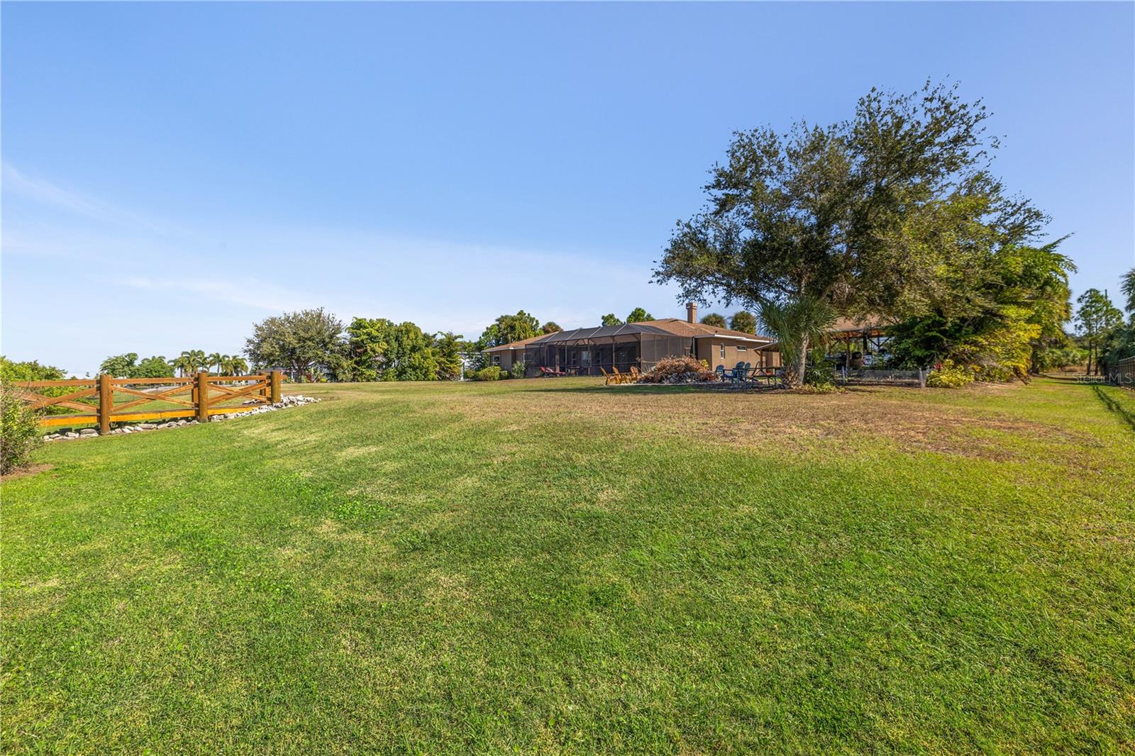 Back of property showing the elevation to home.