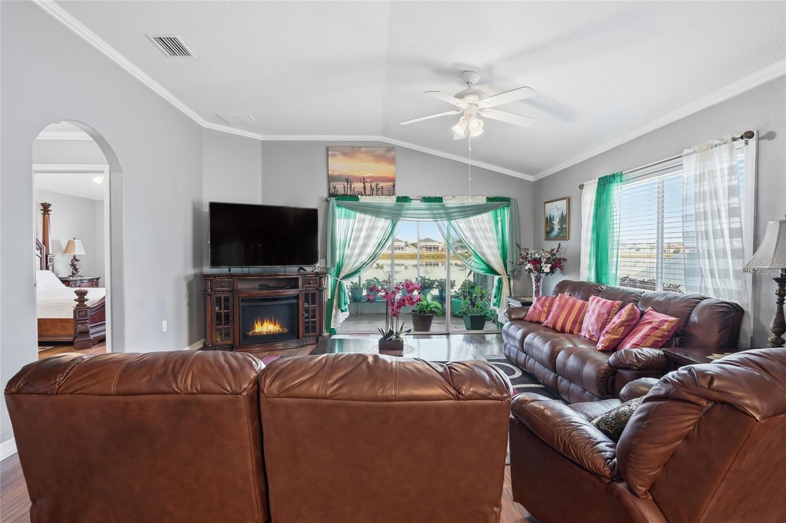 very large living area with stunning water view