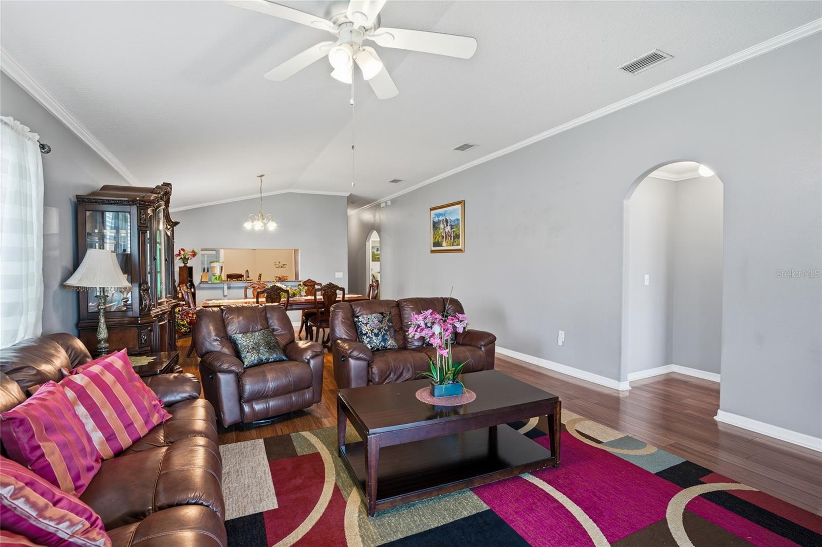 notice the arched doorways and crown molding