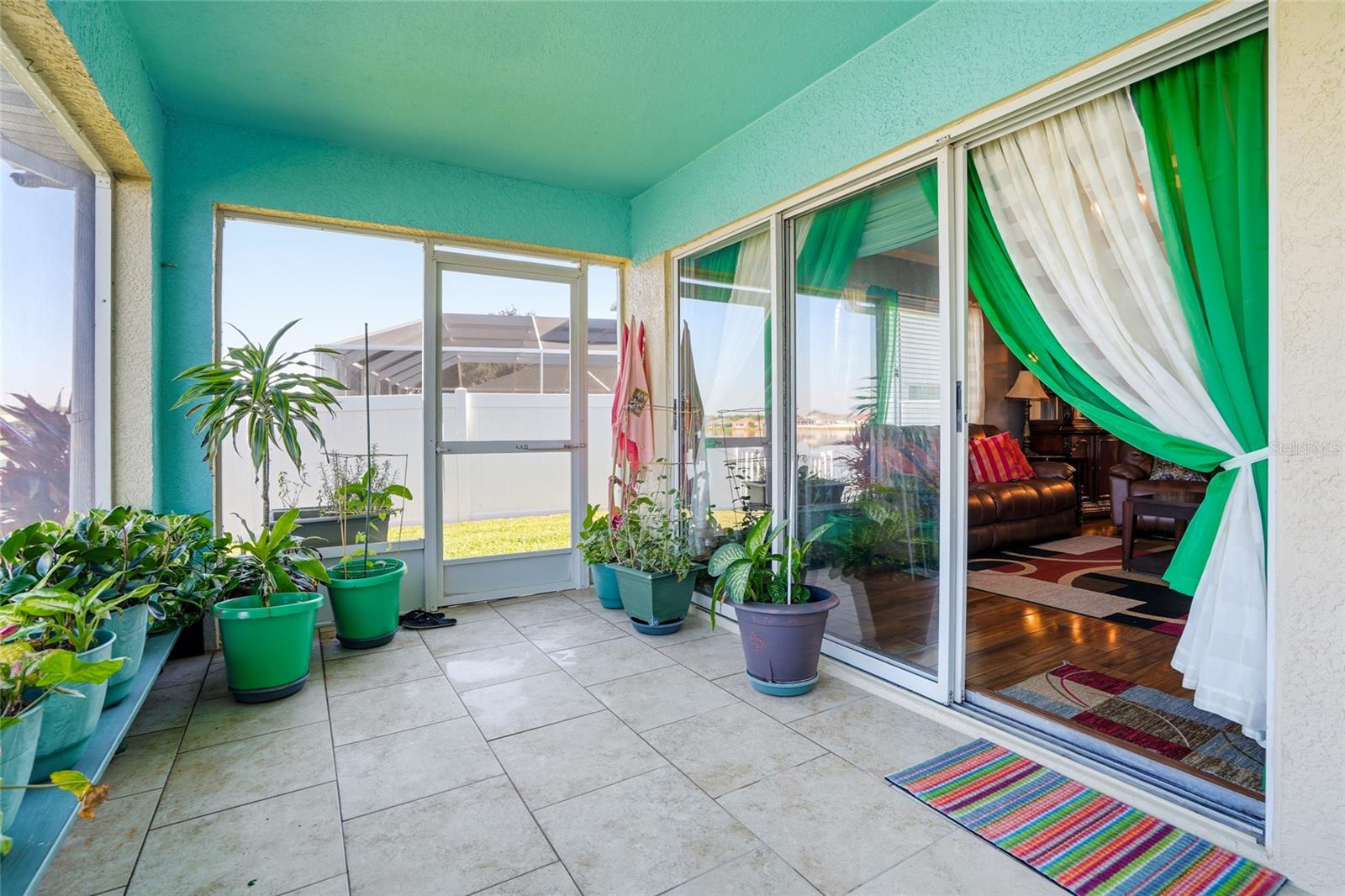 beautiful sliding glass doors and nicely upgraded tile lanai
