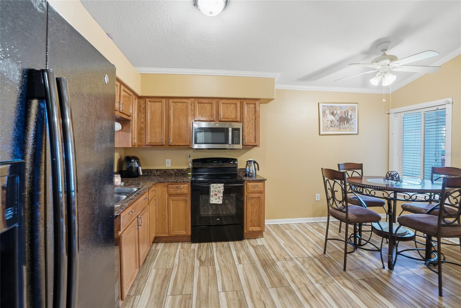 kitchen with plank tile flooring