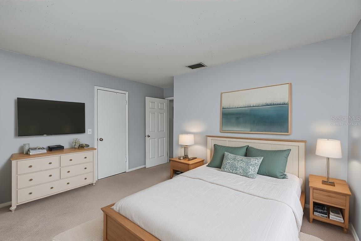 VIRTUALLY STAGED - Primary Bedroom on 1st Floor