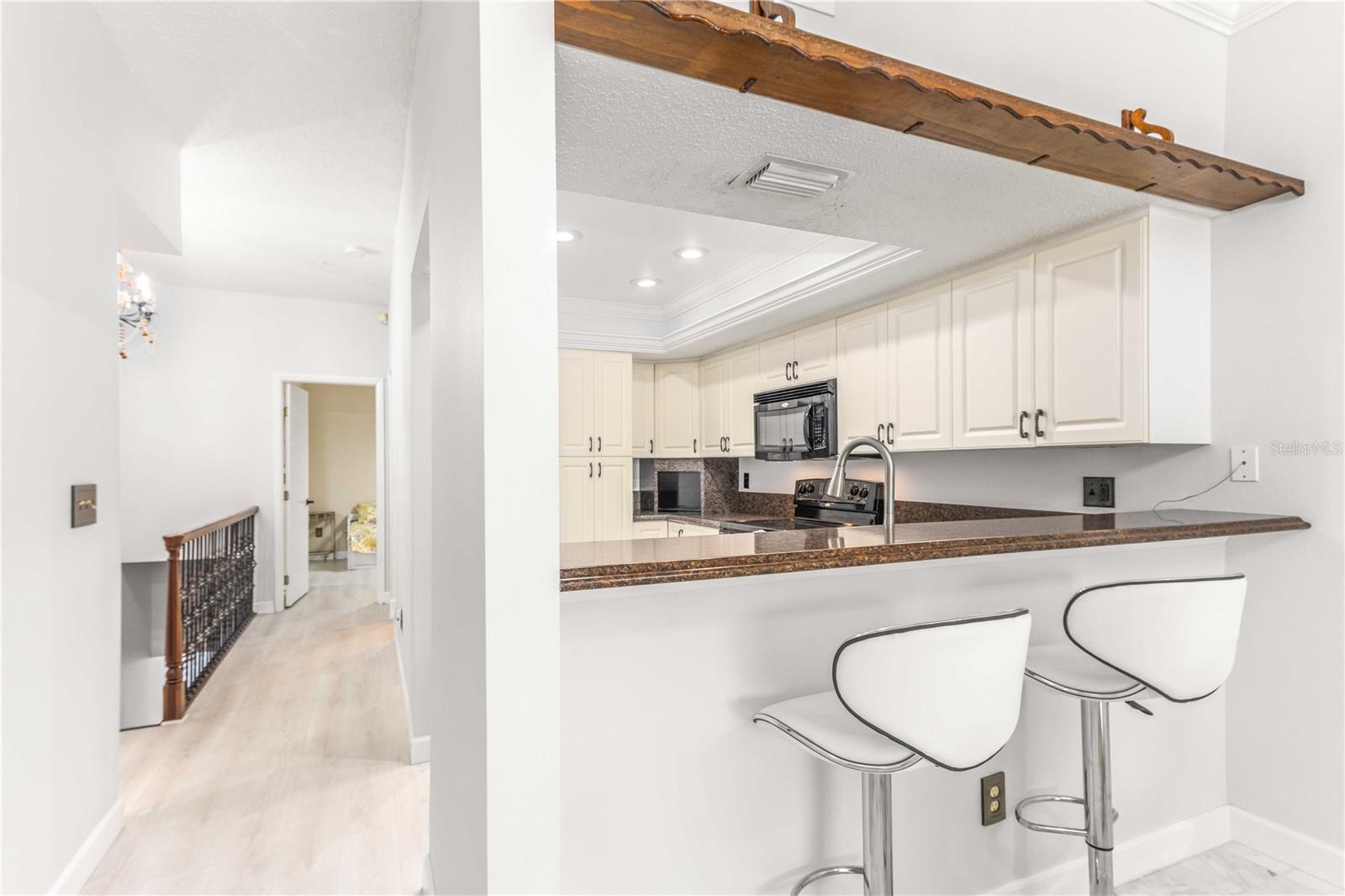 KITCHEN AREA OFF FIRST SET STAIRS