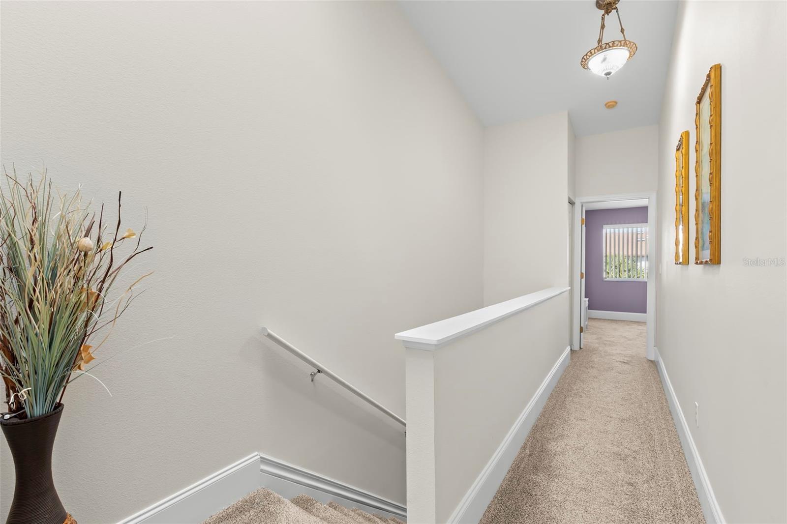 Third floor hall and stairs down to second level.