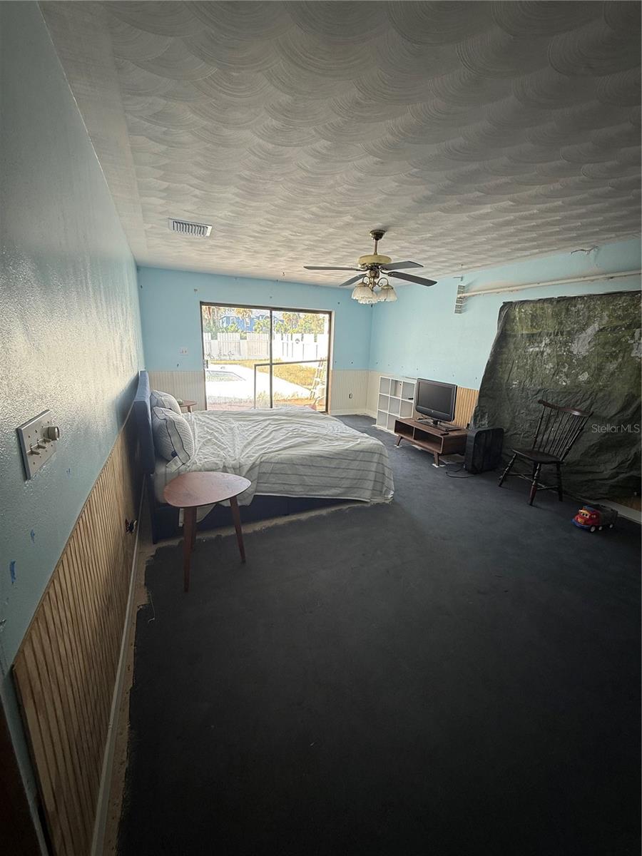 Primary Bedroom View To The Pool
