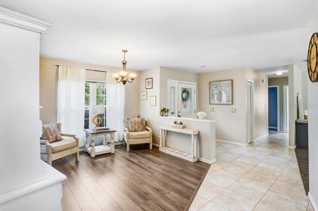 Sitting room with peaceful view into dinette and outdoor lanai