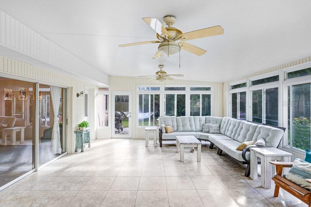 Enormous Lanai with sliders to Living Room and Dining room and pass through to kitchen