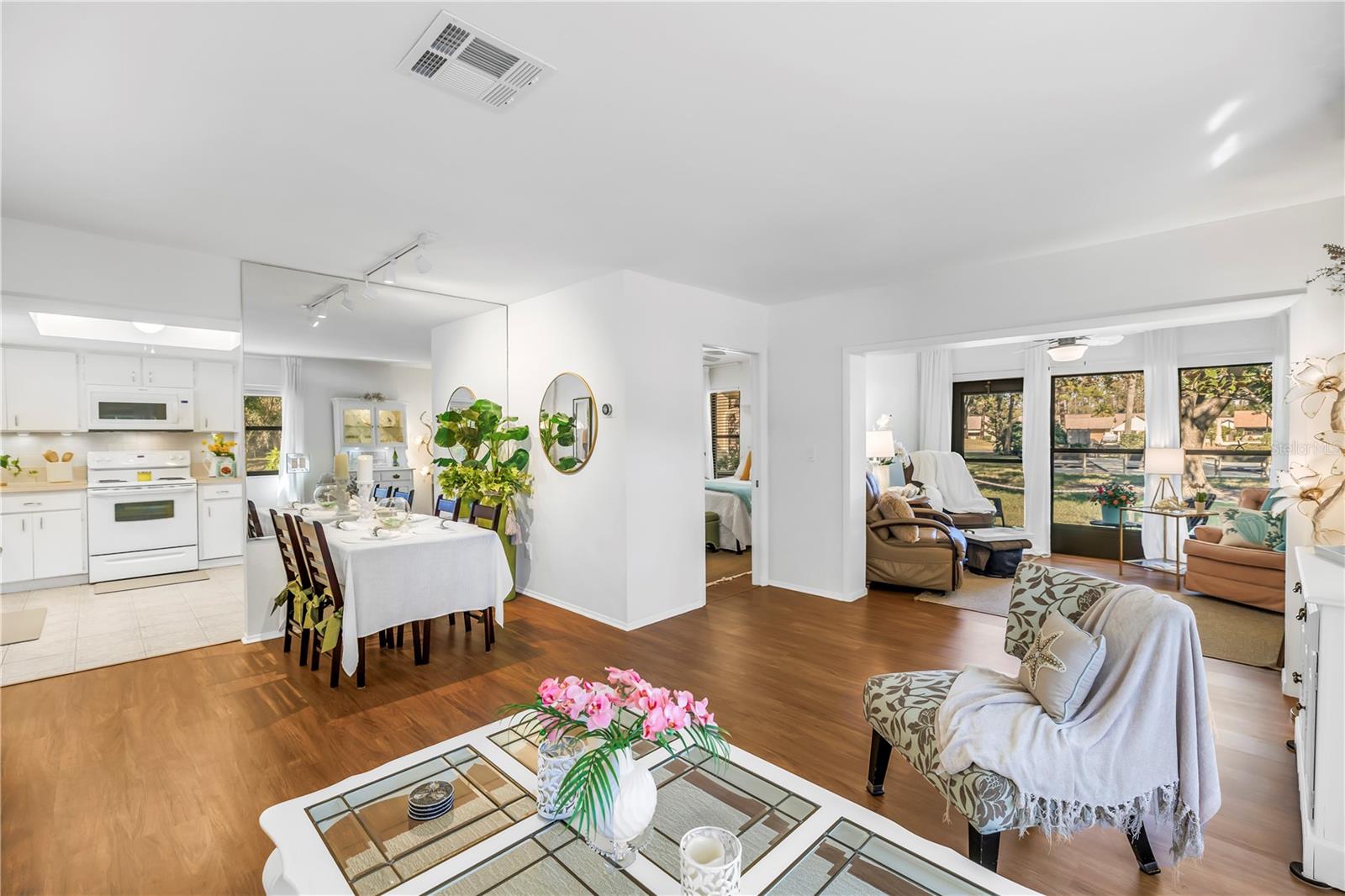 Great Room Open To Enclosed Porch/Florida Room