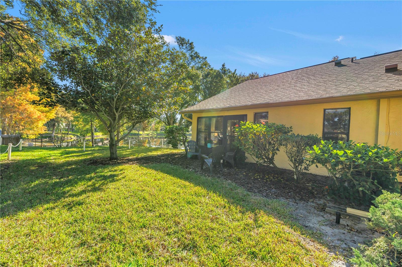 Back Of Villa With Patio Chairs