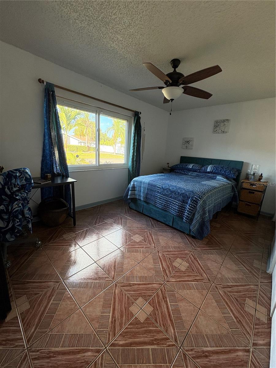 Second bedroom with closet and room for a desk.