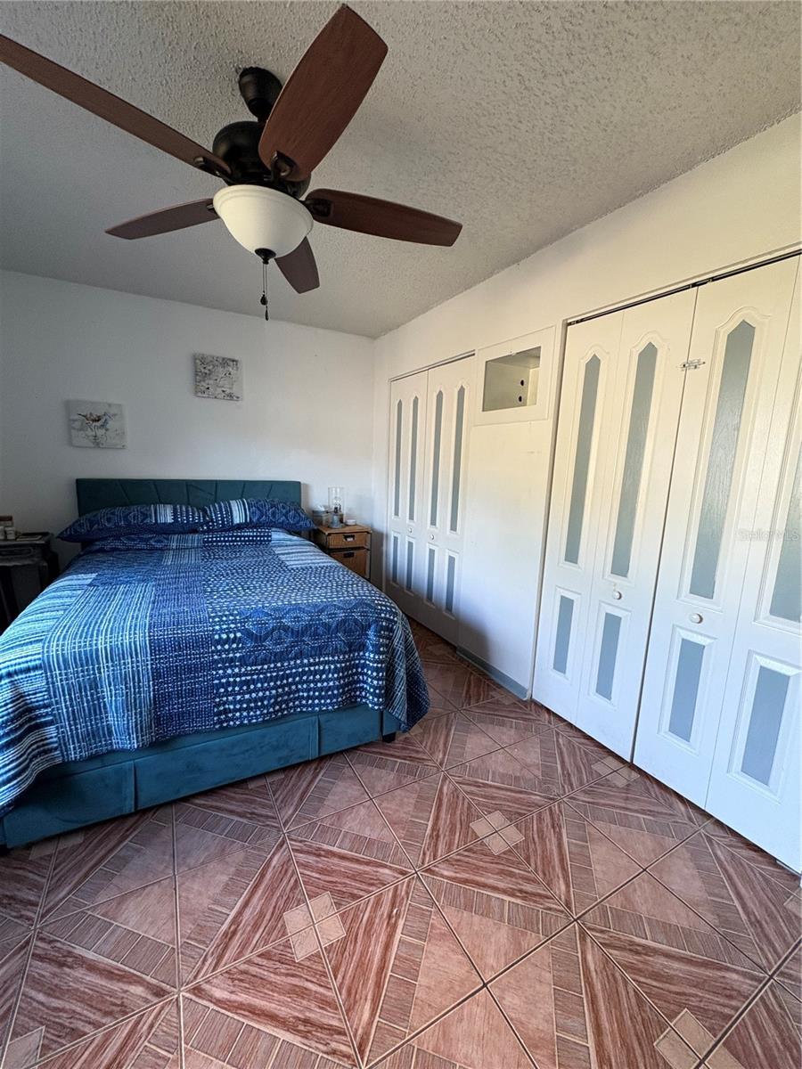 double closets and ceiling fan