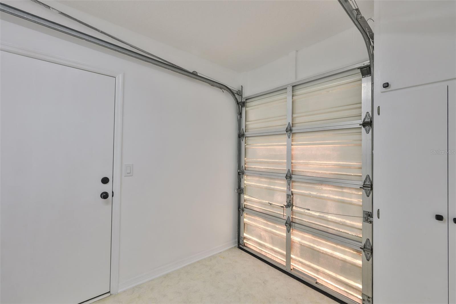 Laundry Room with Golf Cart Garage