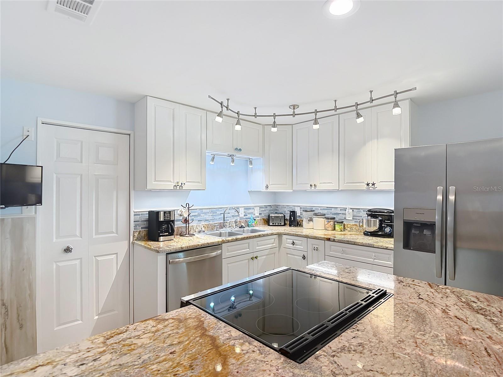 Solid granite counters.  Brand new appliances.