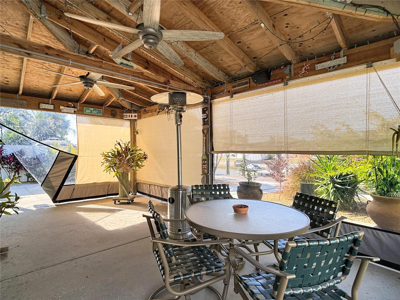 This home has a great exterior covered porch and protection side vinyl coverings for those colder evenings.