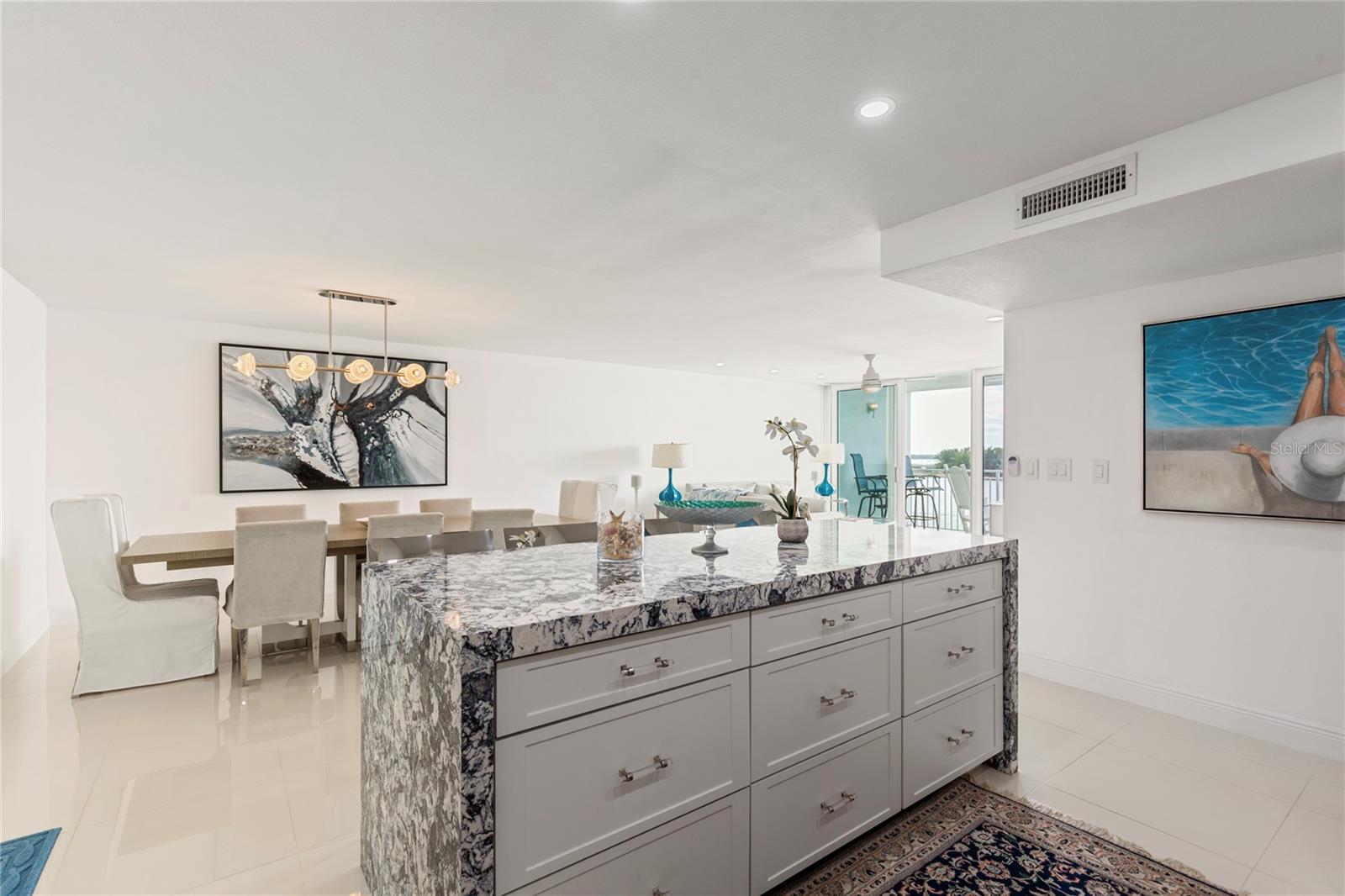 Open Living Room with Dining and Kitchen Island seating too