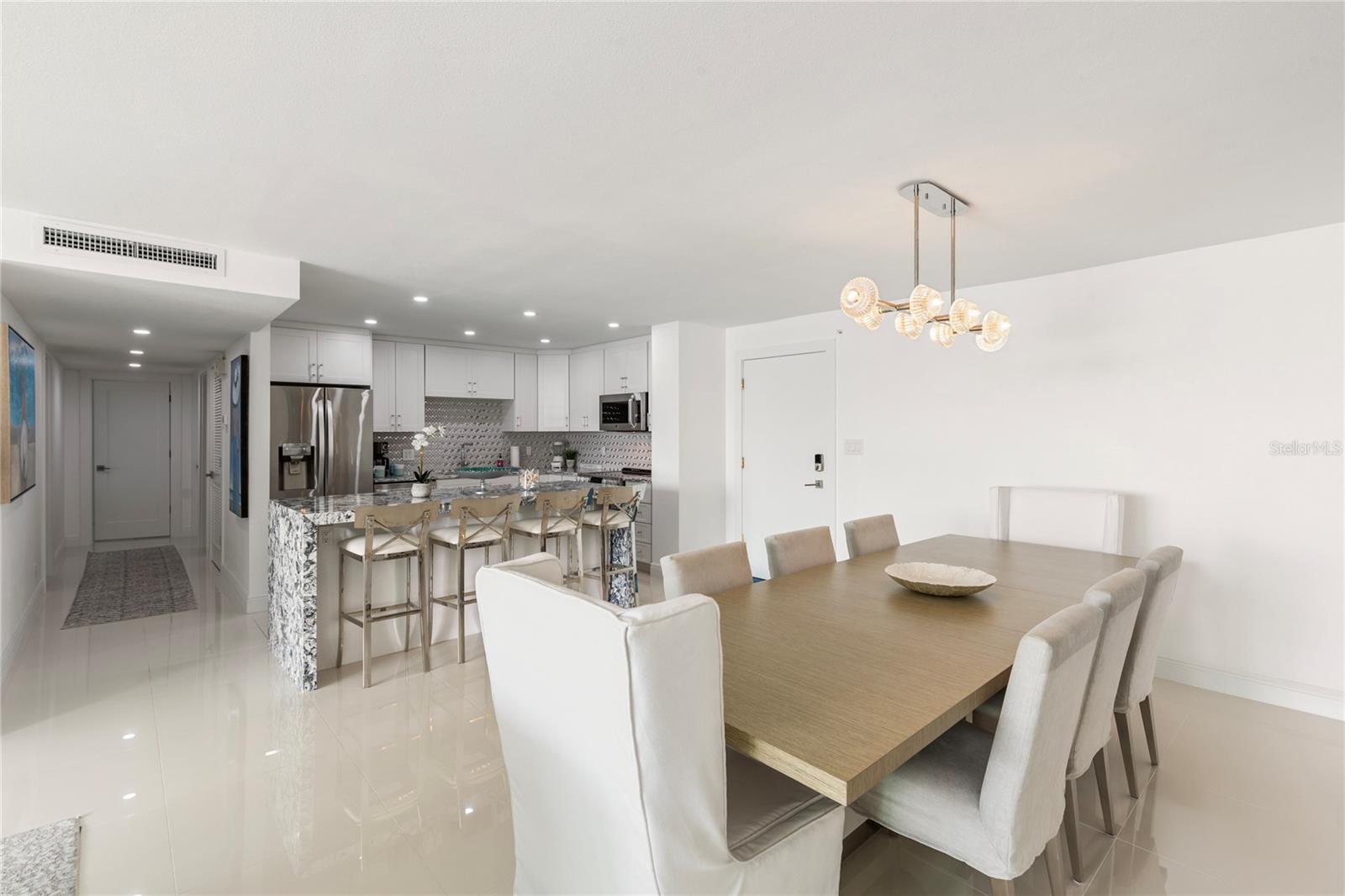 Open Dining /Kitchen and Living Room all with views...