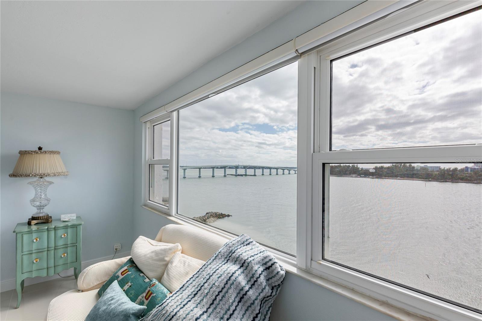 Magnificent Views from Primary Bedroom two walls of windows in this corner unit