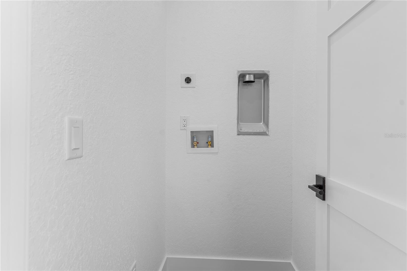 In-Law Suite Laundry room for stackable washer Dryer