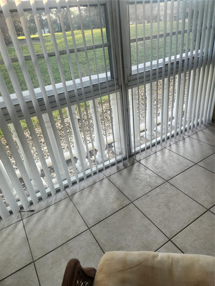 Relax on your Lanai with view of a lovely green Area