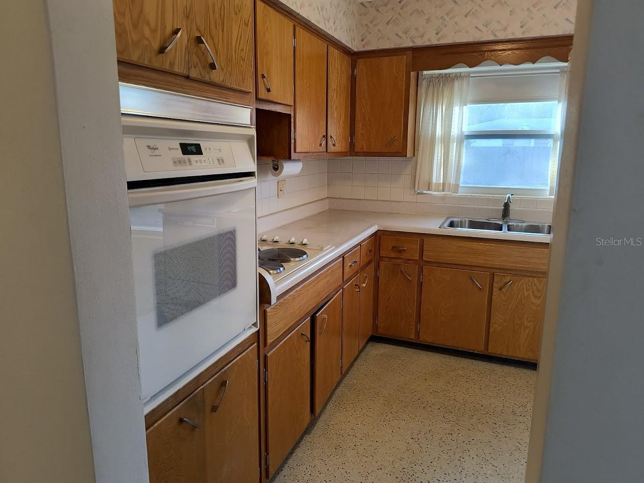 Hallway with kitchen entryway