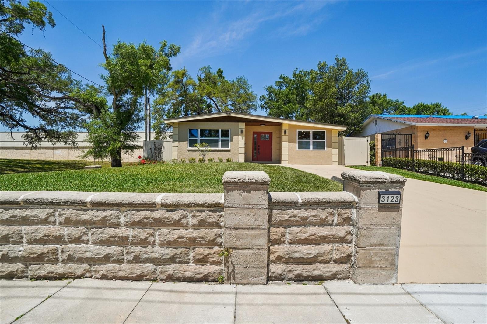 Stone wall built in 1929 reinforced with concrete and rebar.