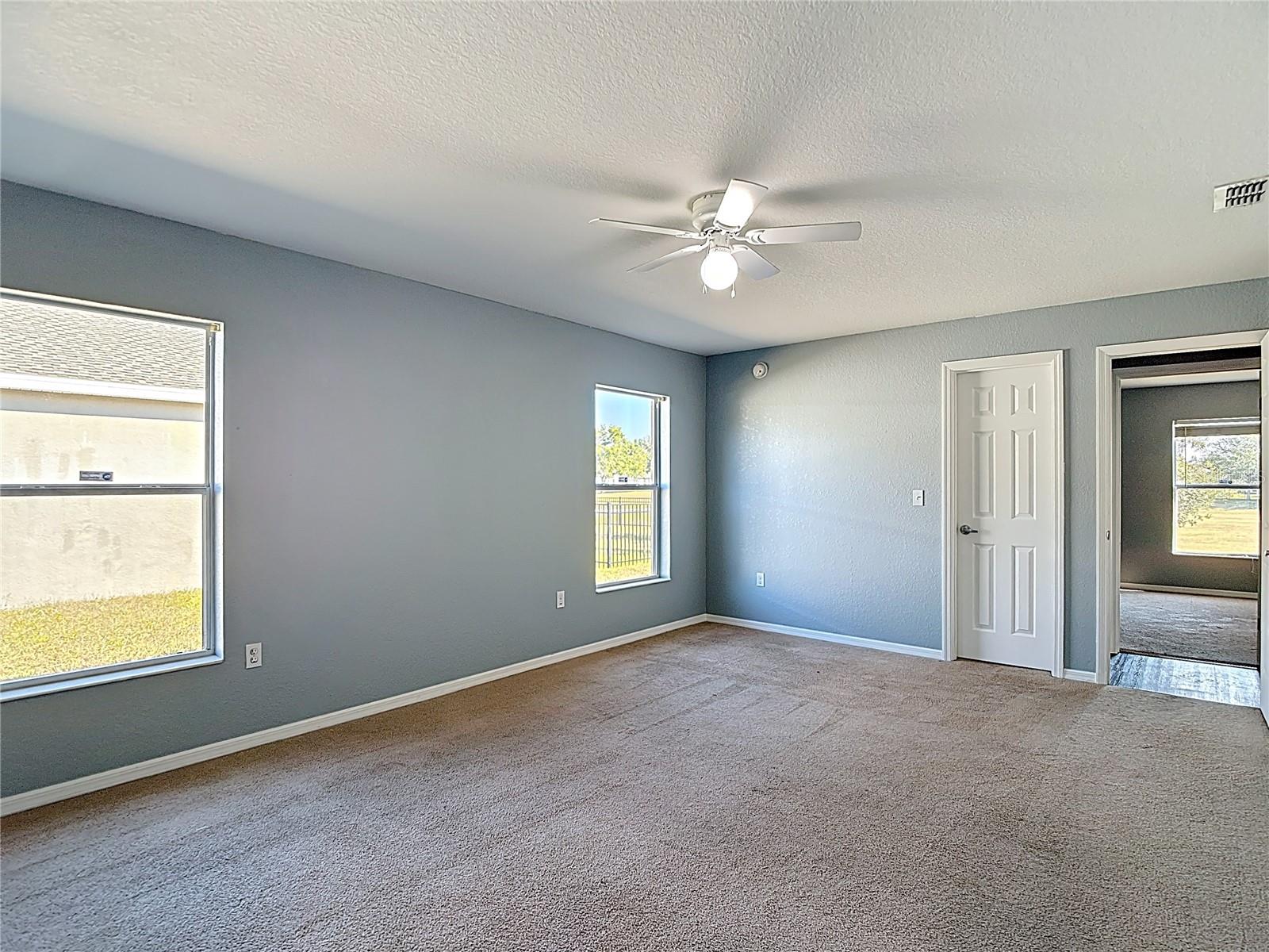 Oversized second bedroom.  Space for two siblings to share.