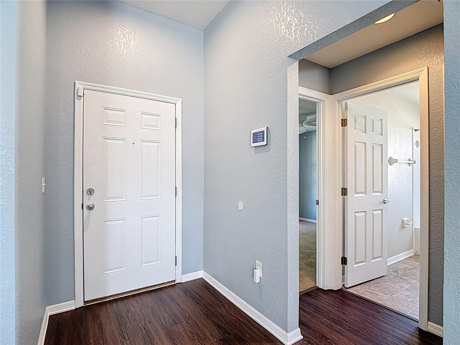 View of the third bedroom and second bathroom.
