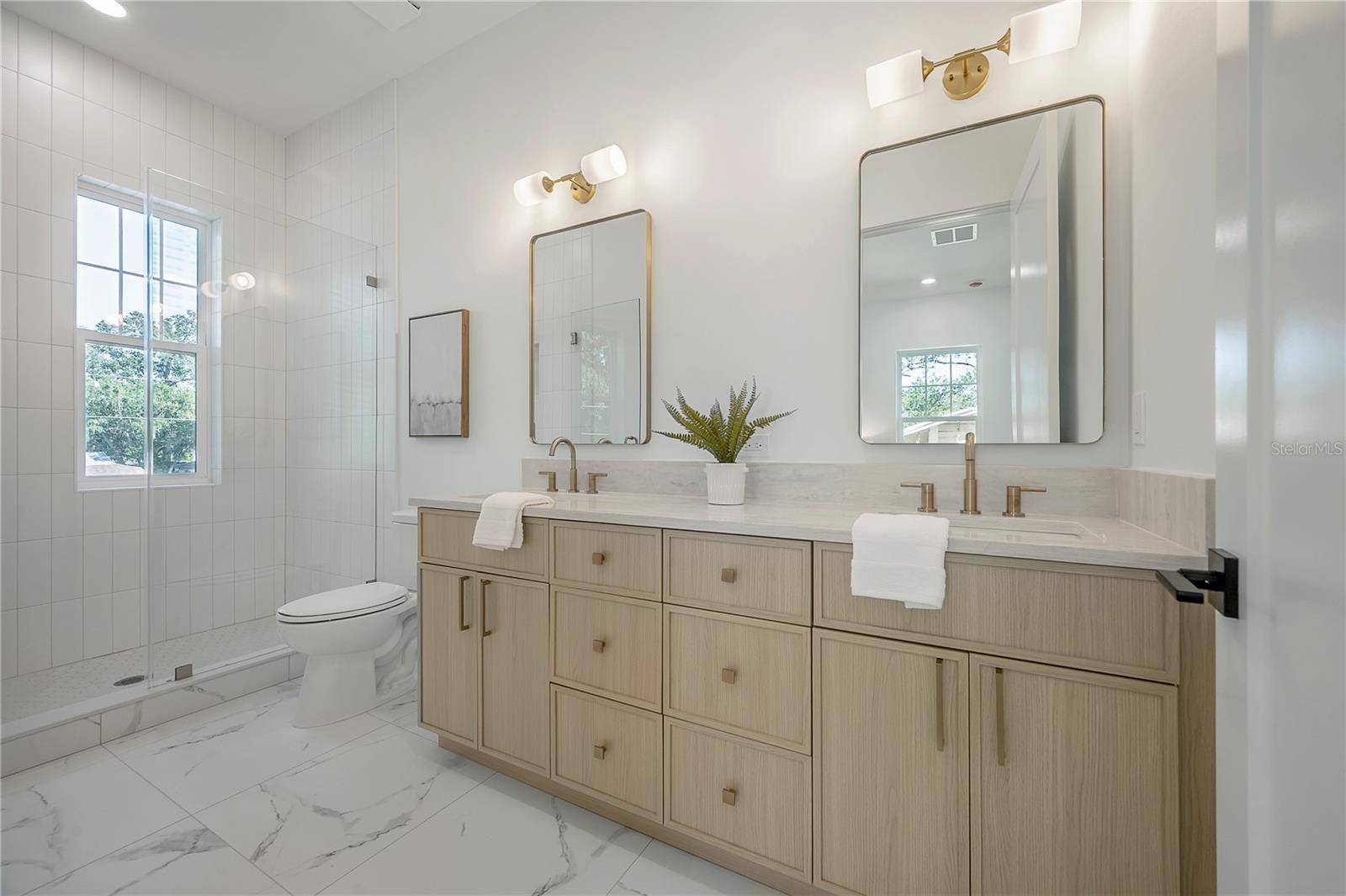 Primary en suite bathroom (upstairs)