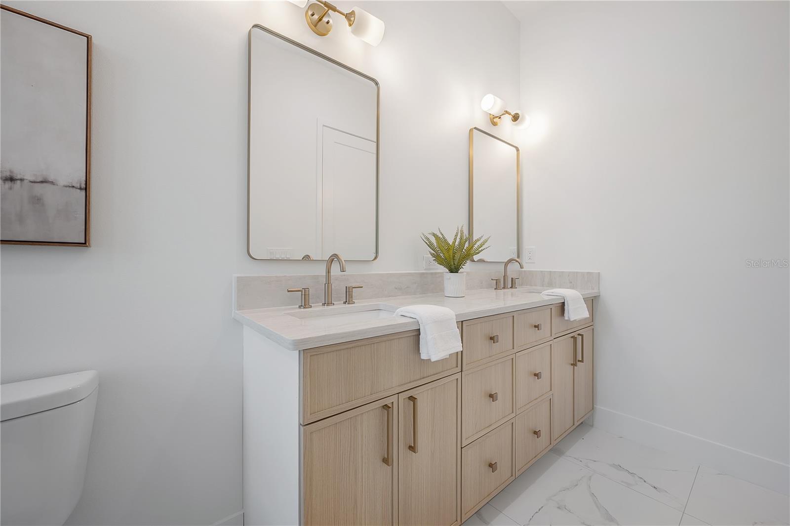 Primary en suite bathroom (upstairs)