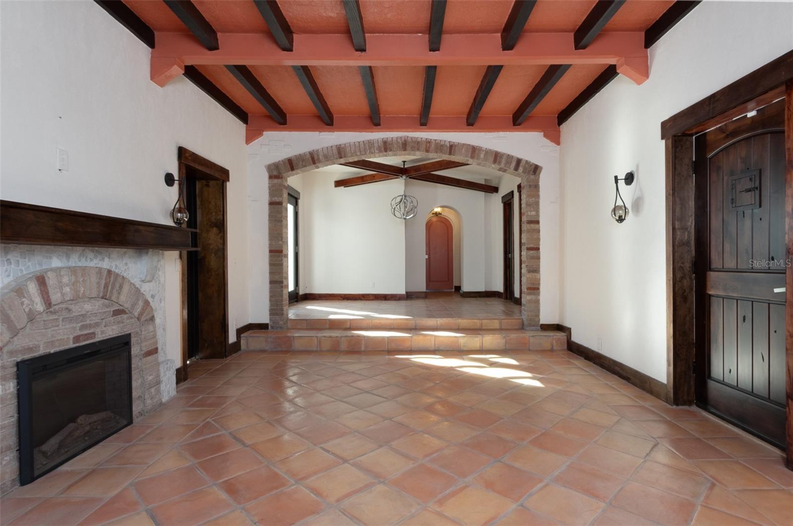 Living room looking onto dining area.