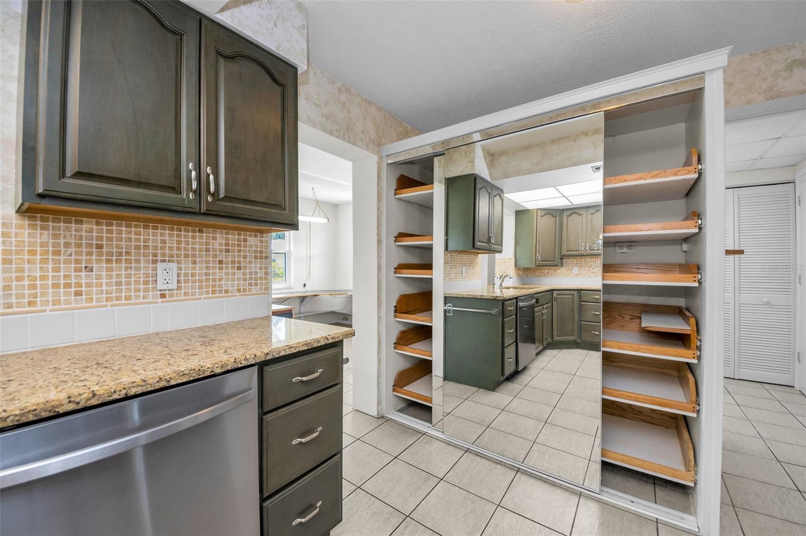 Huge, Customized Kitchen Pantry with multiple pullout drawers!