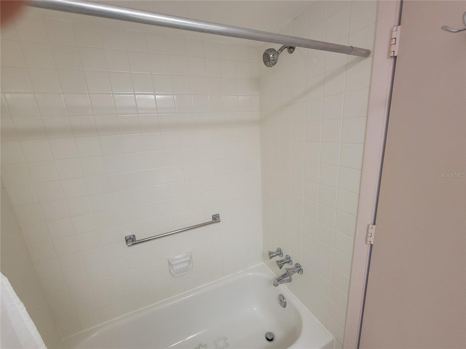 Guest tub shower
