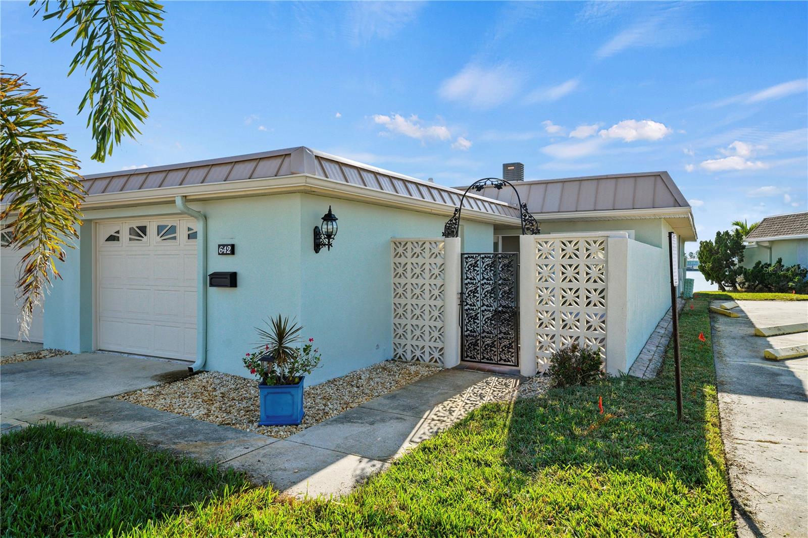 End Unit showing resident guests parking on the right, exclusive to Associations #9 and #12.