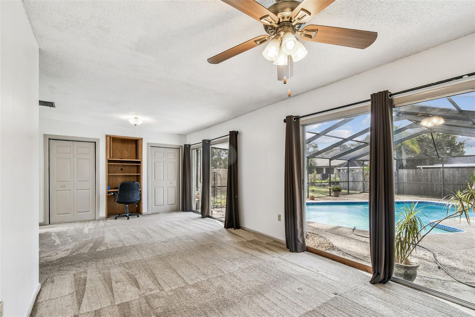 Master Bedroom Opening to Screen Enclosed Pool