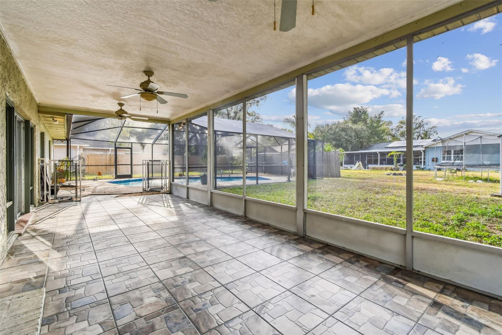Lanai with New Tile Flooring and New Screen