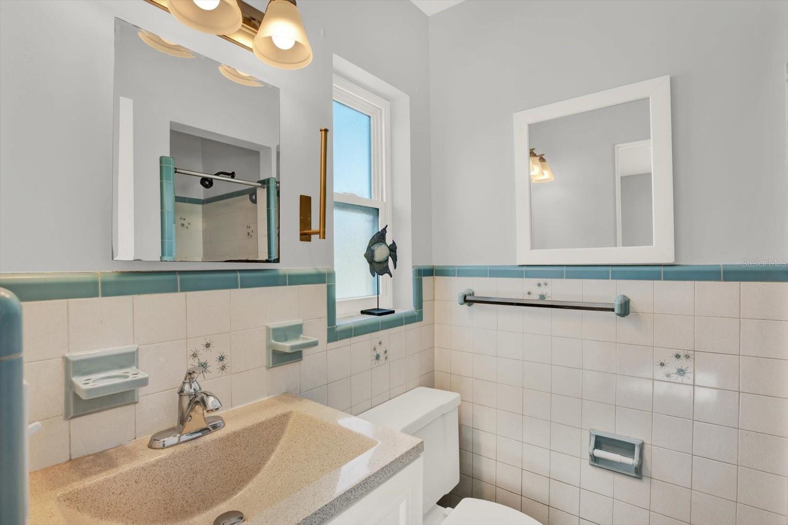 Primary bathroom with shower stall.