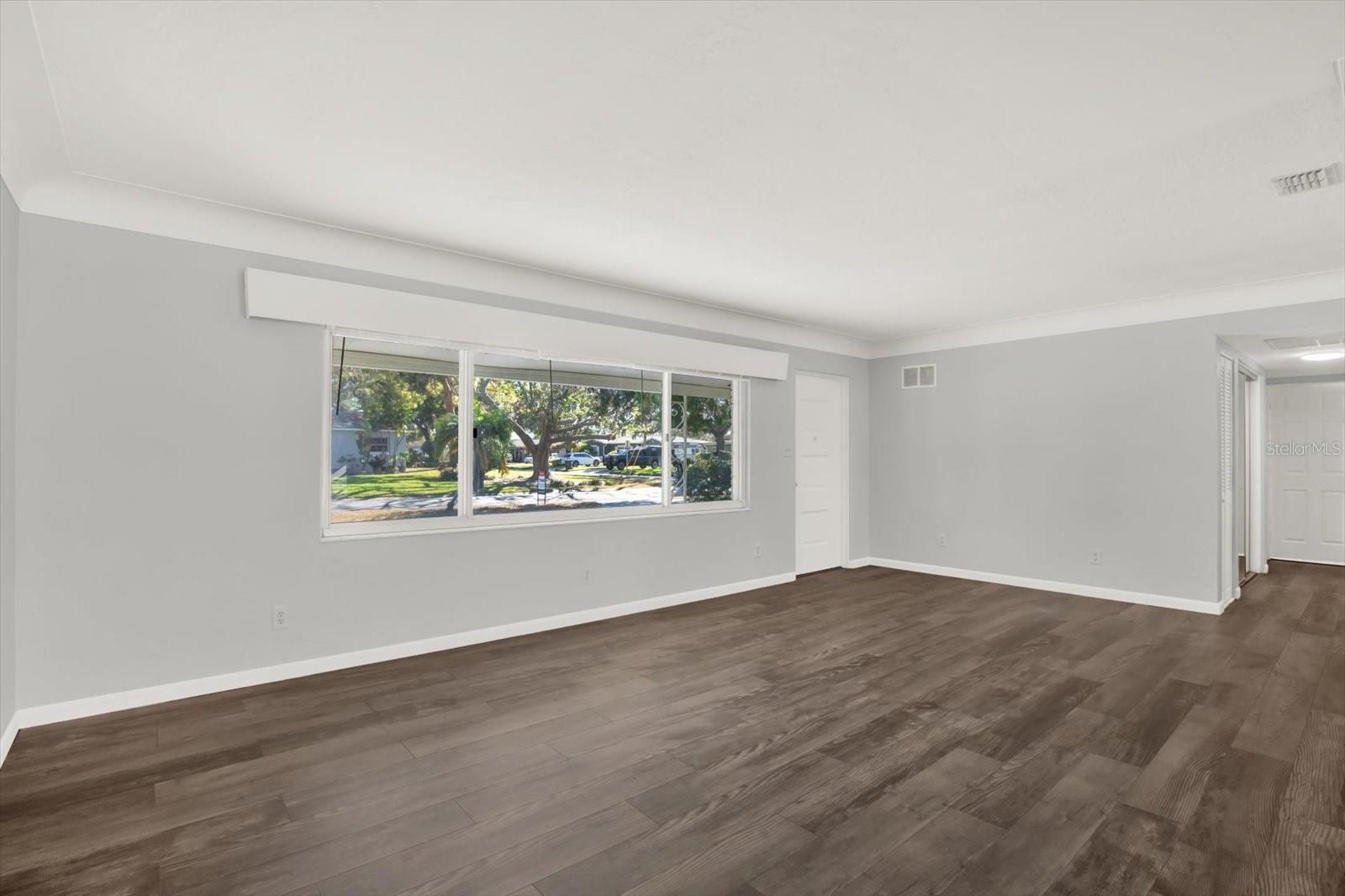 Living Room with triple windows.