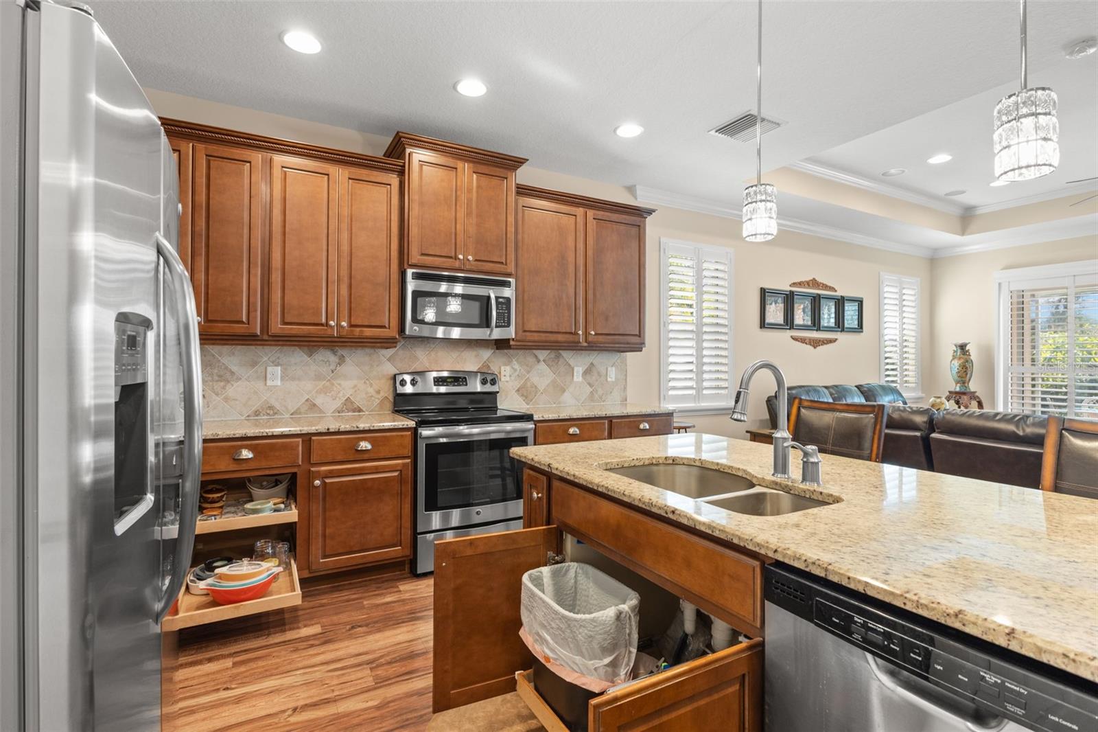 Kitchen showing pull out shelves.