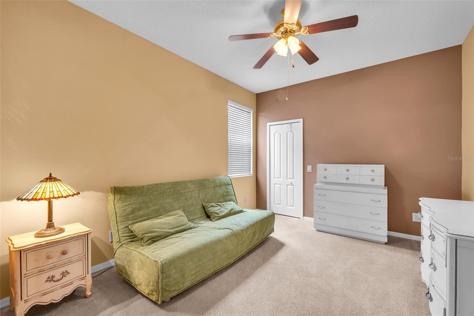 1st floor secondary bedroom with enormous walk-in closet.